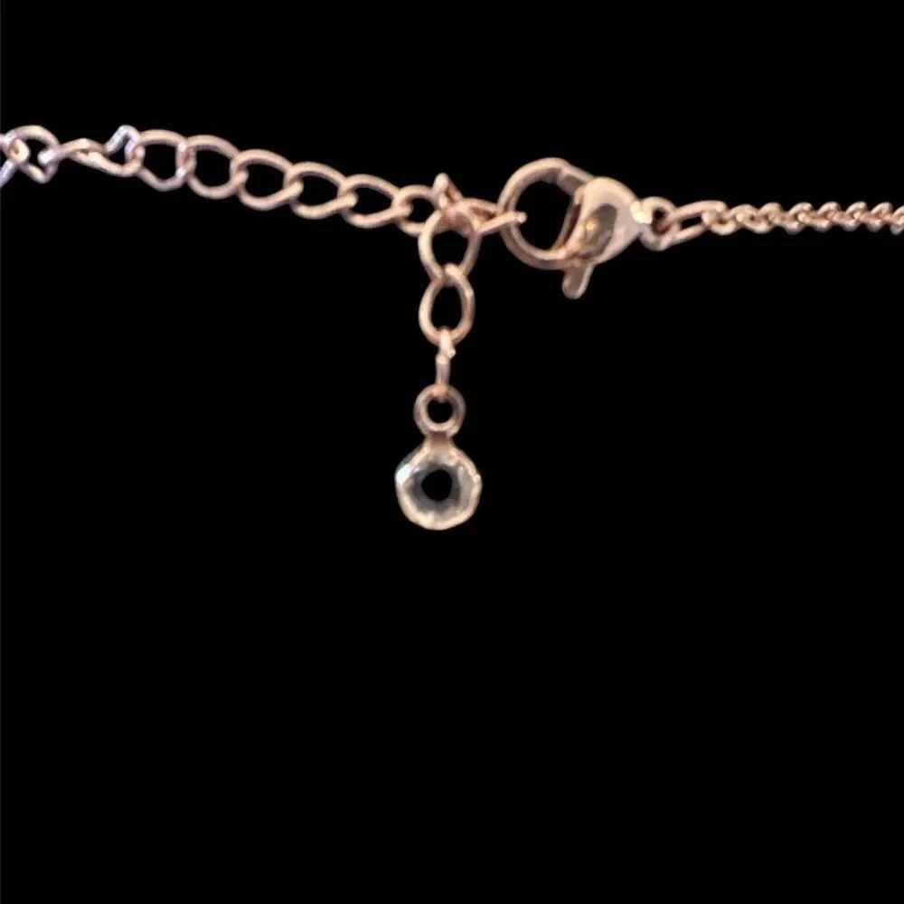 Anoup Rose Gold “I” initial necklace.